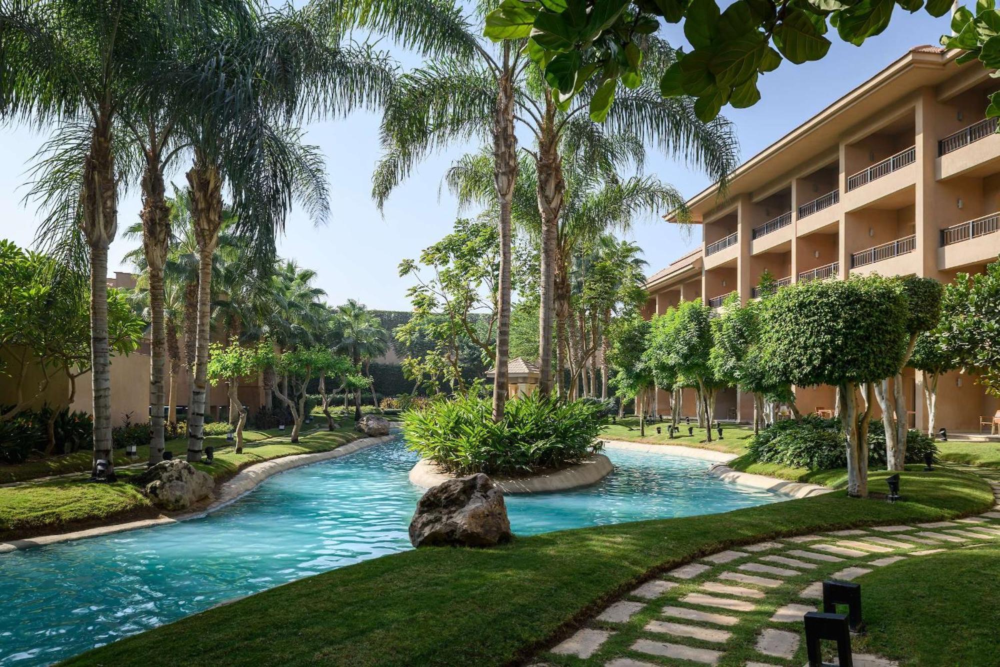 Dusit Thani Lakeview Cairo Exterior photo The swimming pool at the Sheraton Sharm El Sheikh Resort